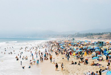 sandy beach filled with people